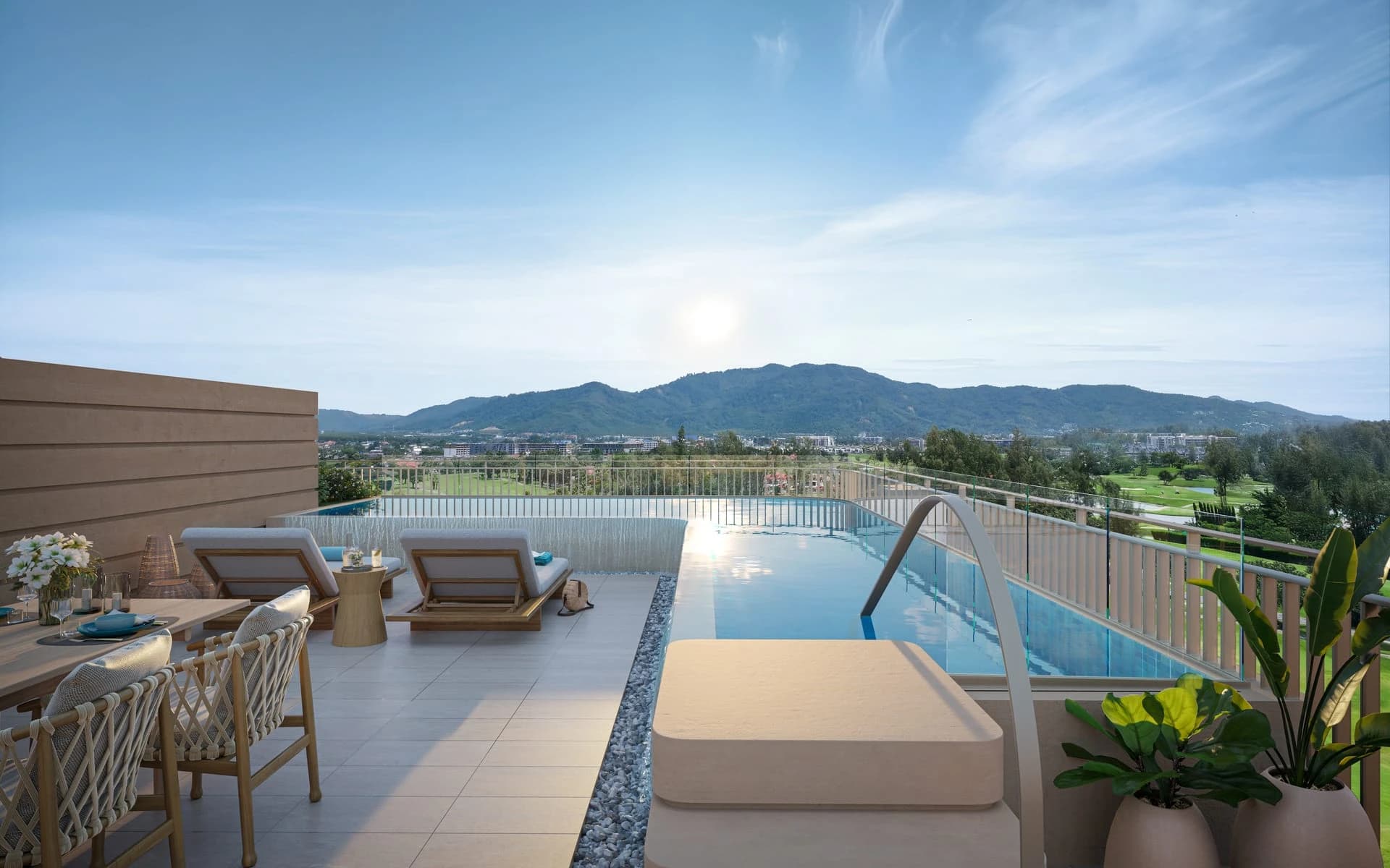 A penthouse rooftop pool looking over the golf course to the hills